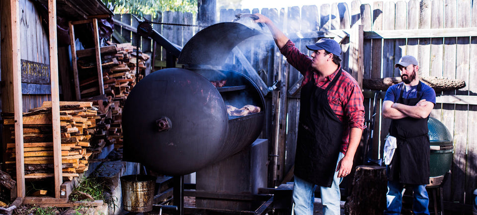 Chris and James by the smoker